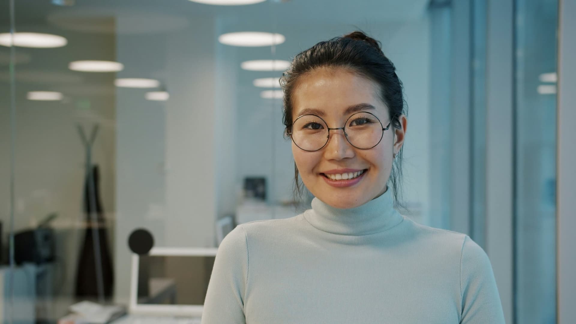 Smiling professional woman in modern office