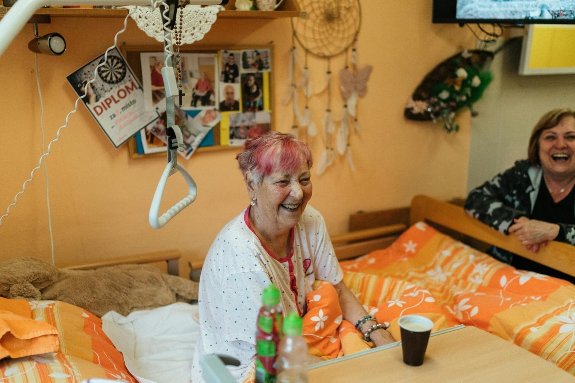 Happy elderly woman receiving quality care