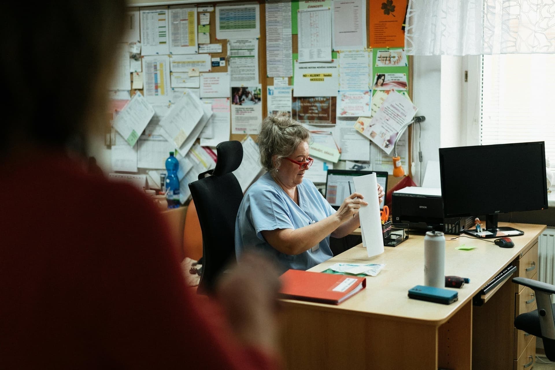 Healthcare administrator working on financial planning