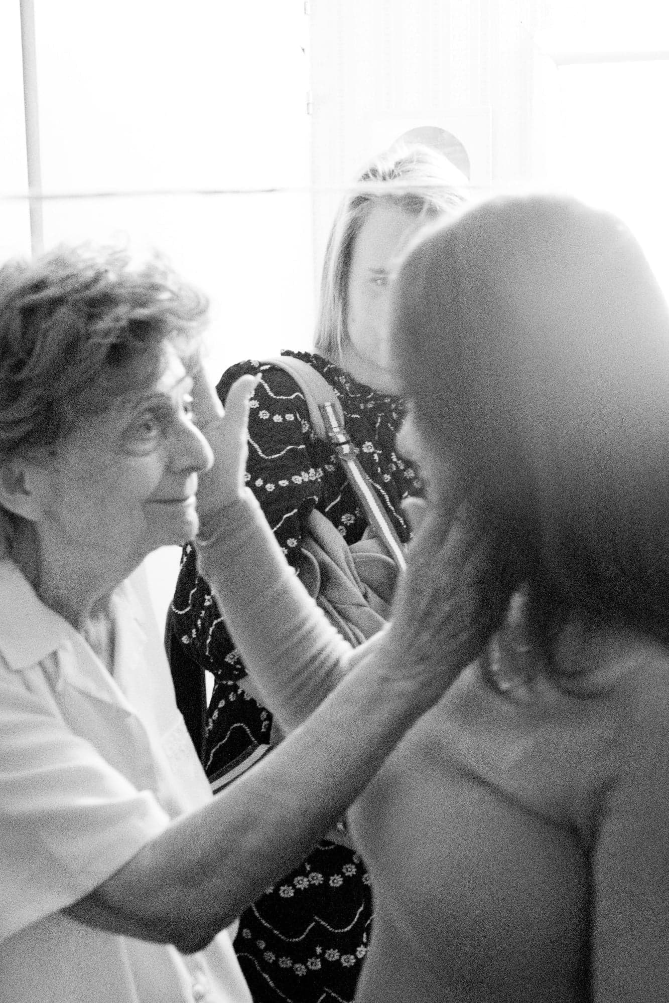 Caregiver providing compassionate support to elderly patient